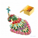 Peacock jewelry box with noble crystals, hard plated and as a hinged jewelry box